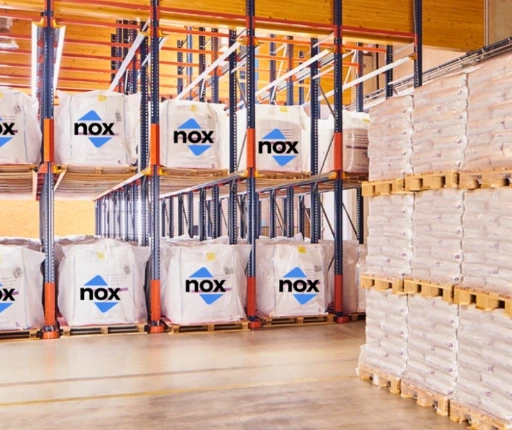Nox hermetic big bags stored on warehouse racks for long-term grain preservation Nox hermetic big bags stored on warehouse racks for long-term grain preservation